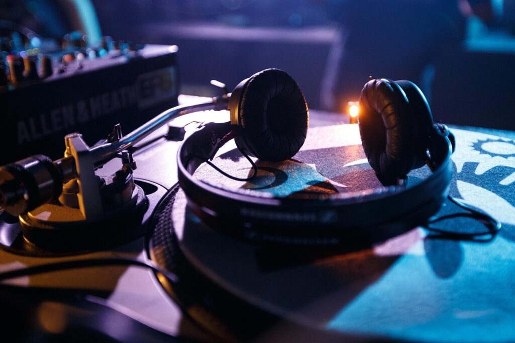 DJ performing music club performance