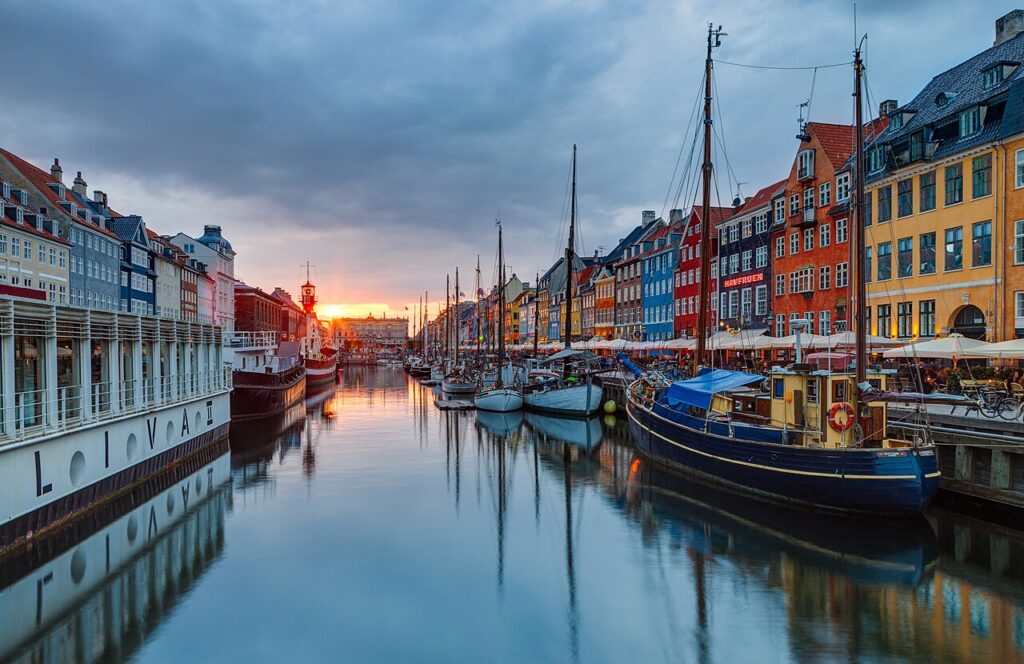 A wide daytime view of Copenhagen's urban streets prepared for a major international road running event.