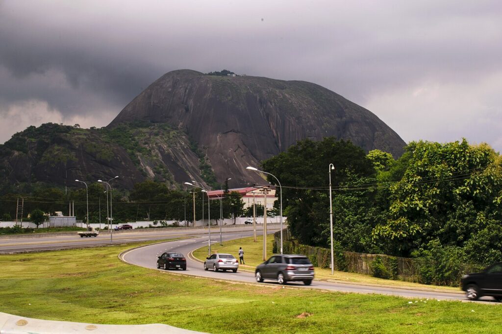 An exterior view of the Nigerian Presidential Villa compound in Abuja with its manicured grounds and administrative buildings.